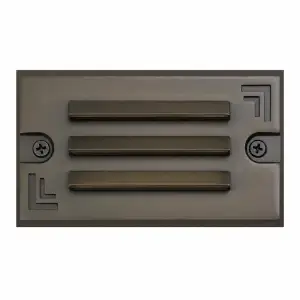 die-case brass step light with bronze finish that is louvered.